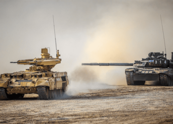 A Russian T-80UE Main Battle Tank and BMPT-72 Terminator during a live fire exercised. (Sputnik)