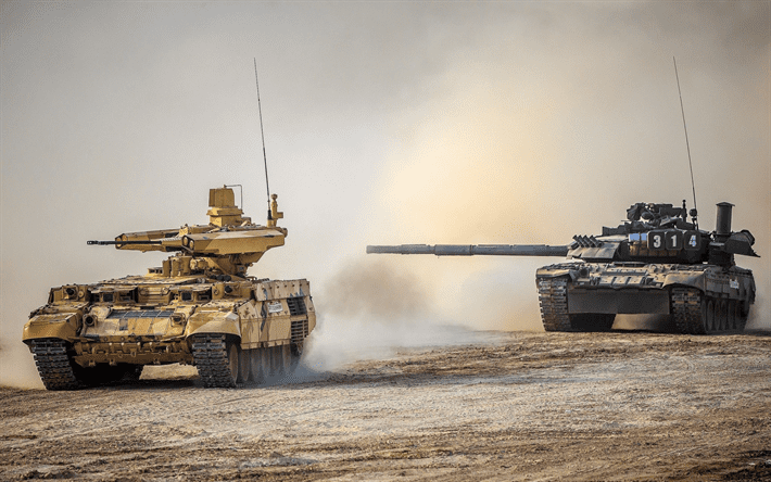A Russian T-80UE Main Battle Tank and BMPT-72 Terminator during a live fire exercised. (Sputnik)
