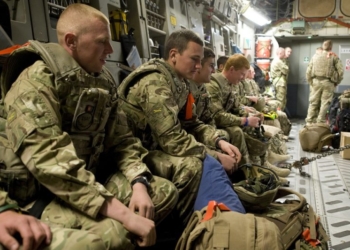 Pictured: Kingsmen from Burma Company 1 LANCS on board an RAF C-17 Globemaster Aircraft beginning their journey back to the UK.

The first British troops to leave Afghanistan return home today as security in their area of Helmand Province is handed over to Afghan forces.
The soldiers, all from Burma Company of 1st Battalion The Duke of Lancasterís Regiment (abbreviated ë1 LANCSí), are returning to their barracks in Catterick, North Yorkshire as their patrol base has been closed and the Afghan Uniformed Police (AUP) take responsibility for security in the region.
1 LANCS are part of Task Force Helmand, currently led by the British Armyís 4th Mechanized Brigade, known as ëThe Black Ratsí, and Burma Company are the first of the 500 British troops to be sent home from Afghanistan as announced by the Defence Secretary Phillip Hammond earlier this year.