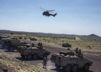 Members of the South African Air Force can be seen flying a Oryx military helicopter as they participate in a military exercise called exercise Seboka at the Aasvoelkop training field in the Northern Cape, South Africa, 25 September 2014.The army held the training exercise to demonstrate its readiness to effectively deploy when commanded. Picture: IHSAAN HAFFEJEE