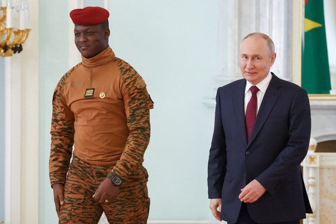 FILE PHOTO: Russia's President Vladimir Putin and Burkina Faso's interim President Ibrahim Traore meet following the Russia-Africa summit in Saint Petersburg, Russia, July 29, 2023. Alexander Ryumin/TASS Host Photo Agency via REUTERS.