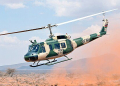 A Kenya air force UH-1 Huey takes off after rescuing a simulated isolated pilot during the final demonstration of African Partnership Flight Kenya 2019. Larisoro Air Strip, Kenya, August 24, 2019. This year's APF Kenya was co-hosted by the U.S. and Kenya and shared best practices regarding personnel recovery. (U.S. Air Force photo by Master Sgt. Renae Pittman)