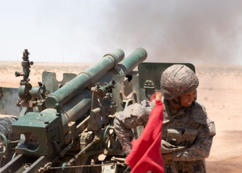 Tunisia military artillerymen carry out a fire mission during exercise Flintlock 2024 military training at their primary training area at Ben Ghilouf. (U.S Military DVID)
