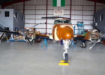 A Nigerian air force Dornier 228 utility aircraft undergoing in-house maintenance in the NAF Executive Airlift Group hanger in Abuja, Nigeria in May 2025.