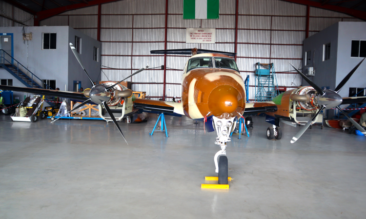 A Nigerian air force Dornier 228 utility aircraft undergoing in-house maintenance in the NAF Executive Airlift Group hanger in Abuja, Nigeria in May 2025.