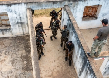 Members of the Malagasy Gendarmes Groupe de Securite et d’Intervention Speciale conduct close quarters combat during the culminating exercise of a Joint Combined Exchange Training near Ivato, Madagascar, June 27, 2025. Malagasy forces collaborated with U.S. special forces to strengthen their capabilities in counterterrorism, border and maritime security and disaster response. (U.S. Air Force photo by Senior Airman Makensie Cooper)