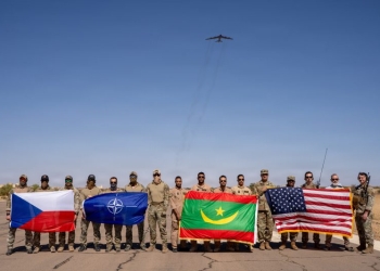 A U.S. Air Force B-52H Stratofortress assigned to the 96th Expeditionary Bomb
Squadron is flown over Czech Special Forces, Mauritanian pilots, and U.S. Forces as part of Bomber Task Force 26-1 and a close air support training event in Atar, Mauritania, November 19, 2025. (U.S. Air Force photo by Tech Set. Katelvnn Moeller)