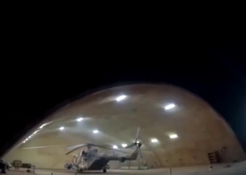 A screenshot of an MIL Mi-171 helicopter destroyed by ISIL.