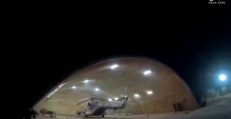 A screenshot of an MIL Mi-171 helicopter destroyed by ISIL.