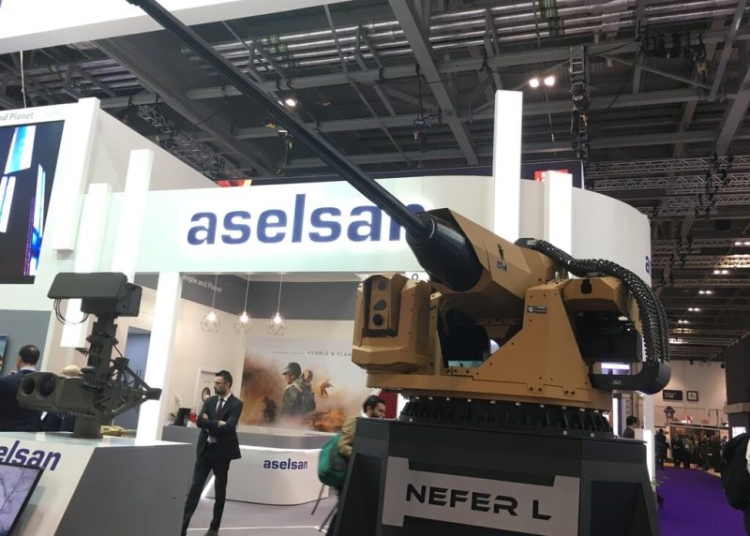 An Aselsan display at DSEI shows the NEFER-L stabilized weapon station, which can incorporate either a 25mm or 30mm automatic cannon as the main gun, a 7.62mm machine gun as a coaxial weapon, and an independent electro-optic suite. (Credit Defence News)