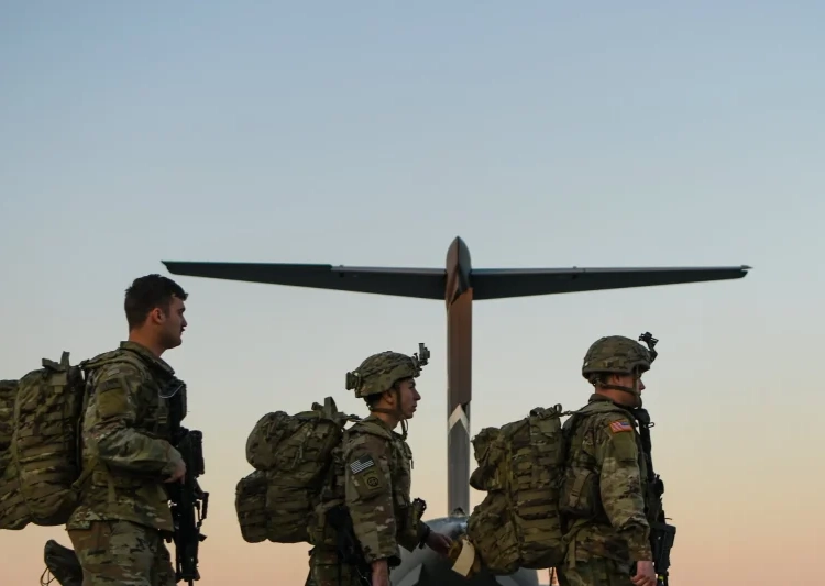 Troops from the 82nd Airborne Division deploying from Fort Bragg, N.C., to Eastern Europe in response to the war in Ukraine in 2022.Credit...Kenny Holston for The New York Times