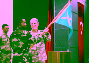Turkish military chief of staff General Hulusi Akar and a Somali soldier participate during the opening ceremony of a Turkish military base in Mogadishu, Somalia September 30, 2017 REUTERS/Feisal Omar Purchase Licensing Rights
