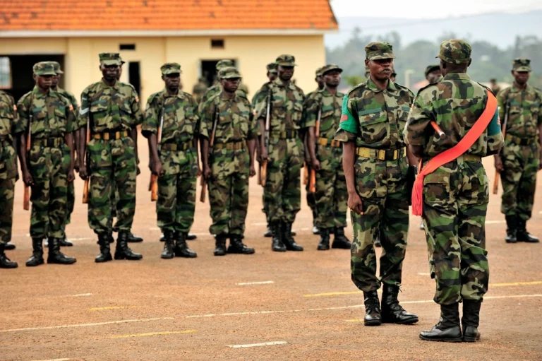 Uganda Peoples Defense Force soldiers stand in formation during a demonstration of skills learned at the UPDF Non-Commissioned Officers Academy in Jinja, Uganda, Jan. 9, 2009. U.S. Soldiers attached to Combined Joint Task Force-Horn of Africa are providing mentorship and assistance to the UPDF NCOA. (U.S. Navy photo by Petty Officer 2nd Class Jesse B. Awalt/Released)
